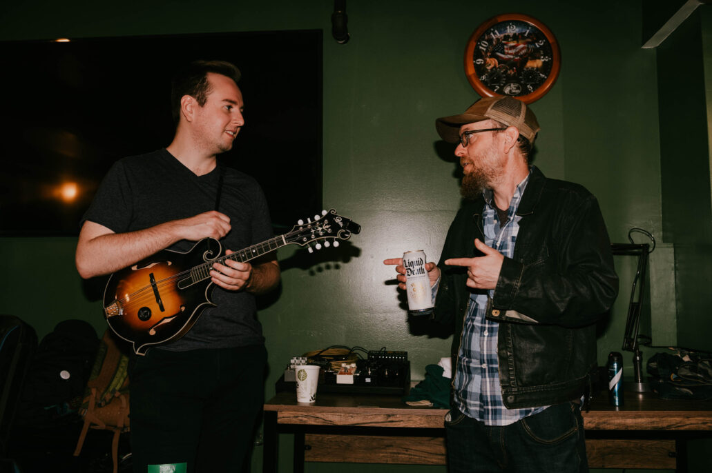 two men prepare to play a show at brighton music hall by boston music photographer lisa czech